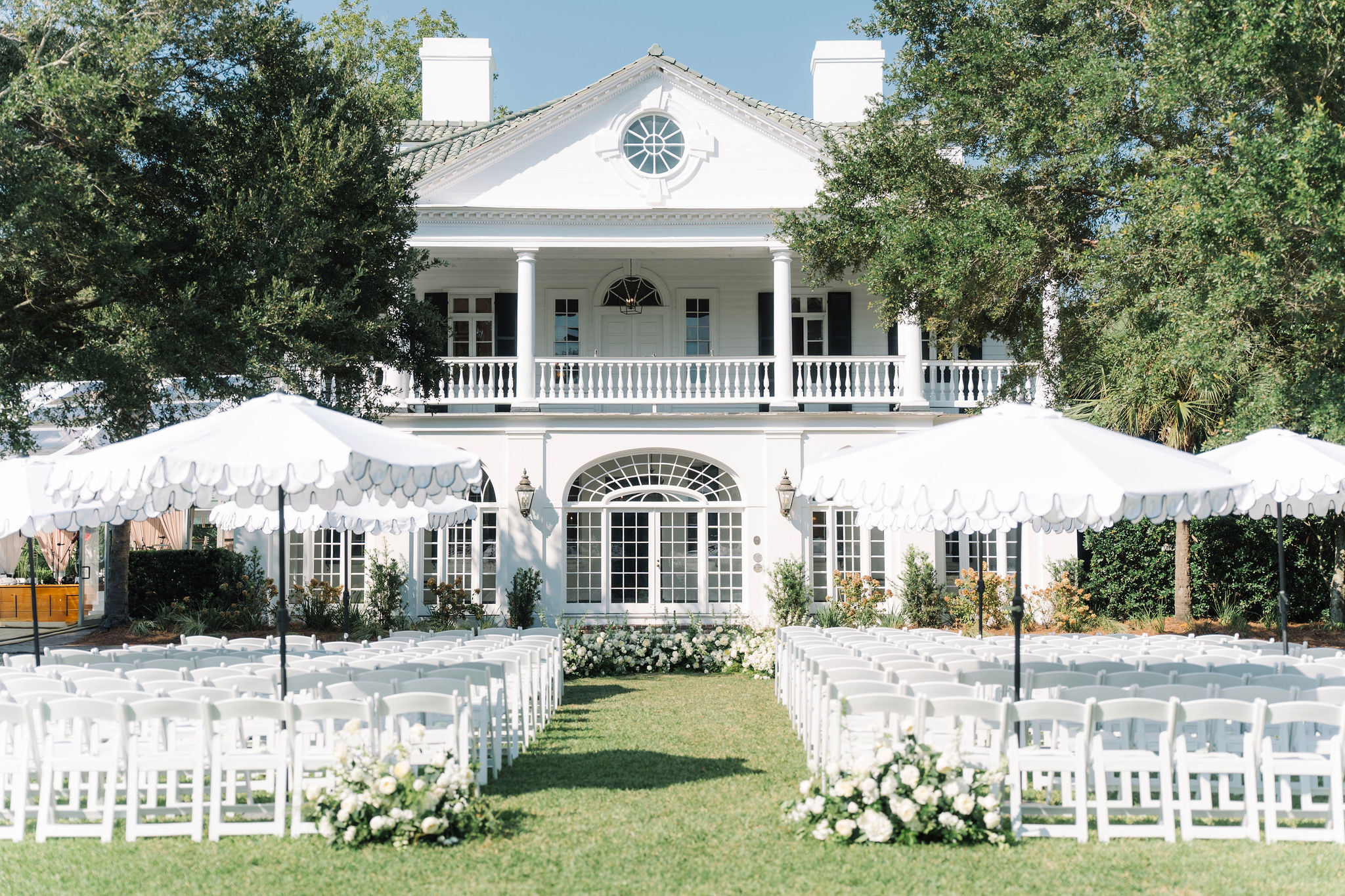 Leigh Davin Lowndes Grove Wedding 437 ANDERSON aaron and jillian photog white structure umbrella