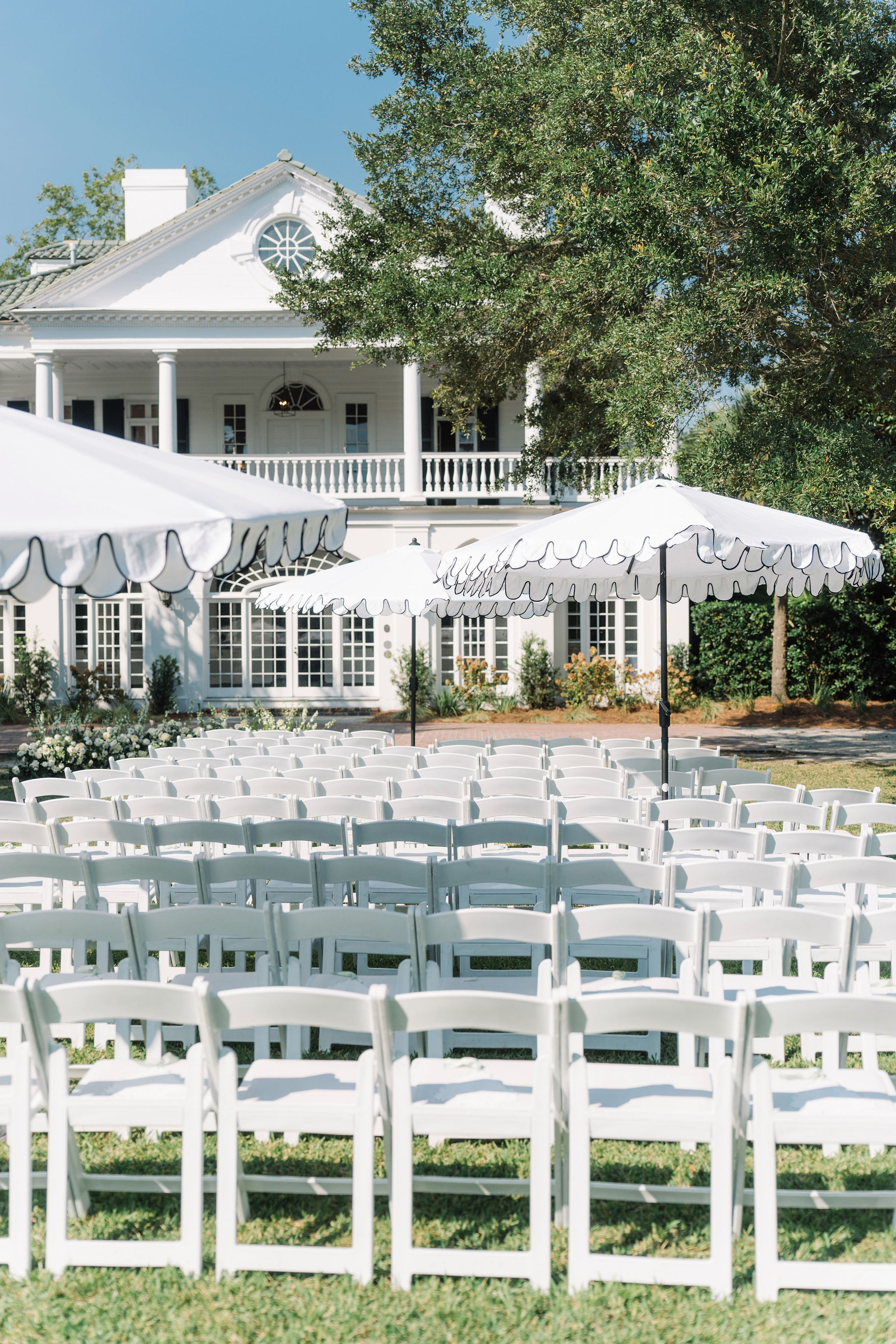 Leigh Davin Lowndes Grove Wedding 440 ANDERSON aaron and jillian photog white structure umbrella